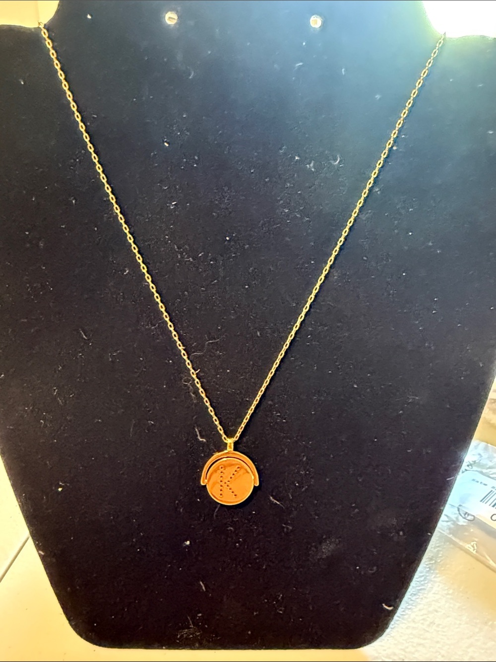 henri bendel Gold-Tone Round Spinning Pendant Necklace Initial K